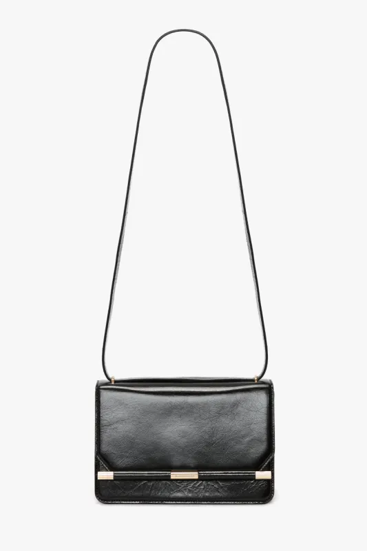 202 Crossbody Bag In Black Leather sold by Victoria Beckham