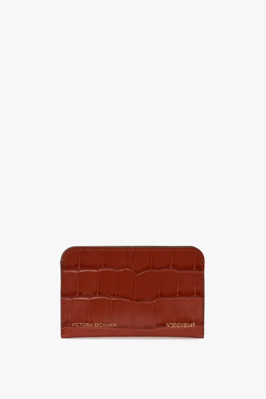 Envelope Card Holder In Brick Red Croc Embossed Leather sold by Victoria Beckham
