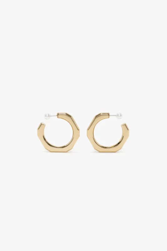 Hexagonal Hoop Earrings In Light Gold sold by Victoria Beckham
