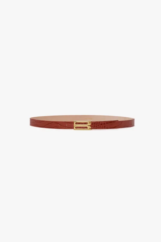 Frame Belt In Brick Red Croc Embossed Leather sold by Victoria Beckham