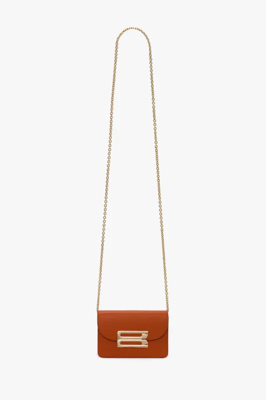 Micro Dorian Bag With Chain Strap In Burnt Orange Grained Leather sold by Victoria Beckham