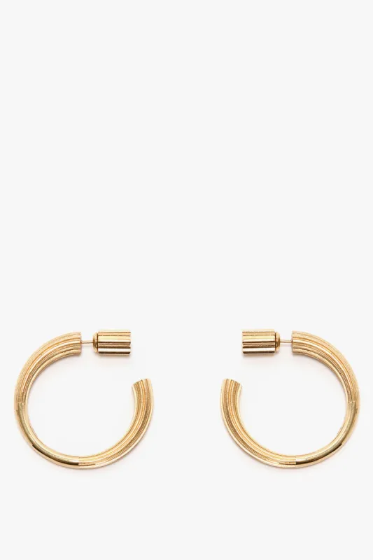 Cufflink Earrings In Light Gold sold by Victoria Beckham