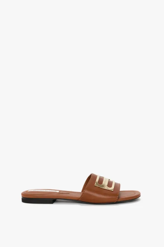 Dorian Slide In Dark Tan Leather sold by Victoria Beckham