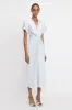 Gathered V-Neck Midi Dress In Ice sold by Victoria Beckham