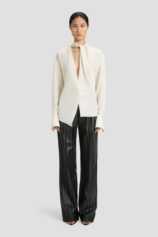 Double Pleat Leather Trouser In Black-Ivory sold by Victoria Beckham
