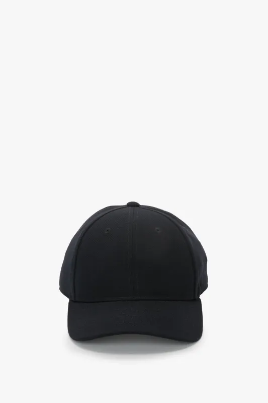 Cap In Navy sold by Victoria Beckham