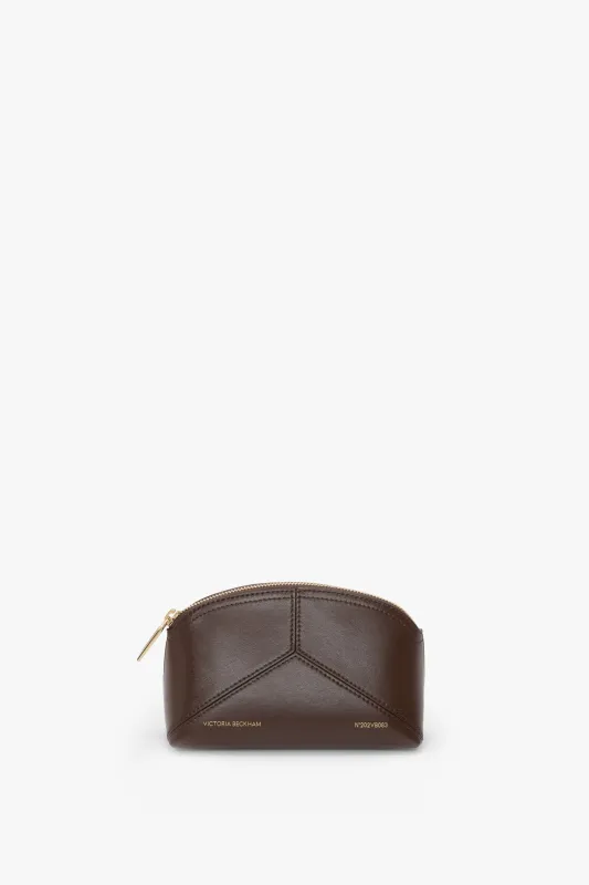 Victoria Mini Travel Pouch In Dark Brown Leather sold by Victoria Beckham