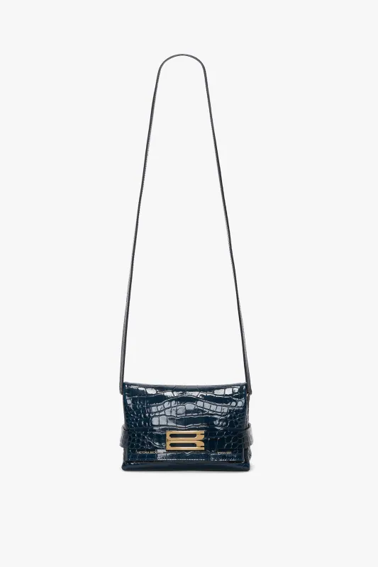 Mini B Pouch Bag In Croc Embossed Midnight Blue Leather sold by Victoria Beckham