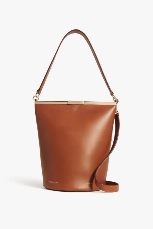 Frame Bucket Bag In Cognac Leather sold by Victoria Beckham