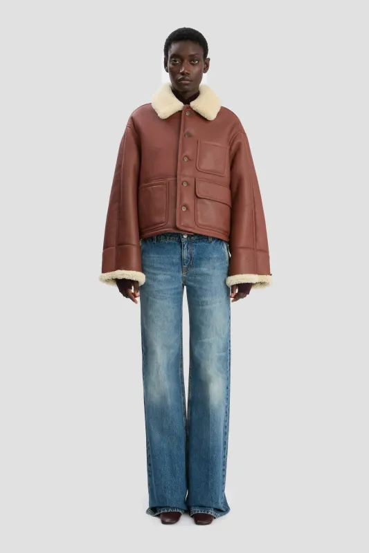 Cropped Shearling Jacket In Brown-Cream sold by Victoria Beckham
