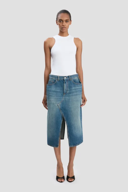 Kick Pocket Denim Skirt In Mid Blue Wash sold by Victoria Beckham