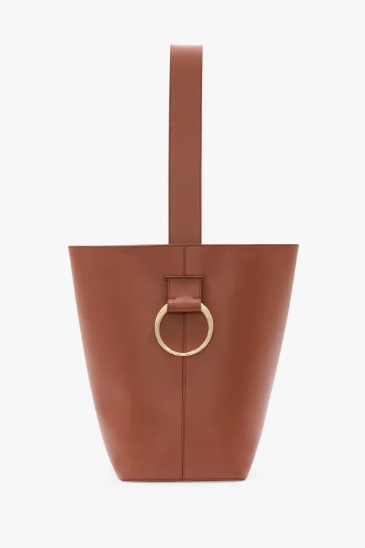 Dia Bucket Bag In Tan Smooth Leather sold by Victoria Beckham
