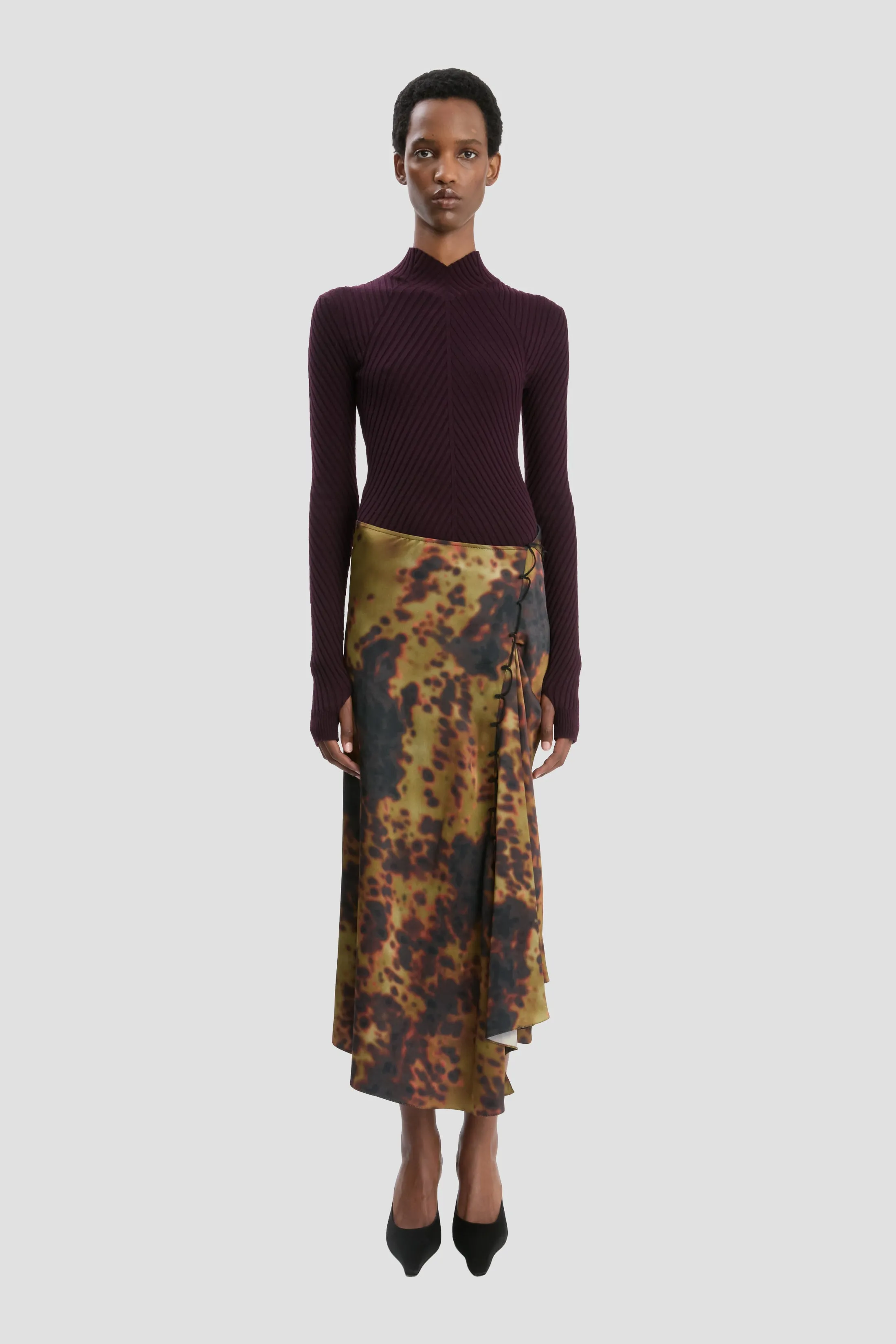 Midi Skirt In Olive Brown Print sold by Victoria Beckham