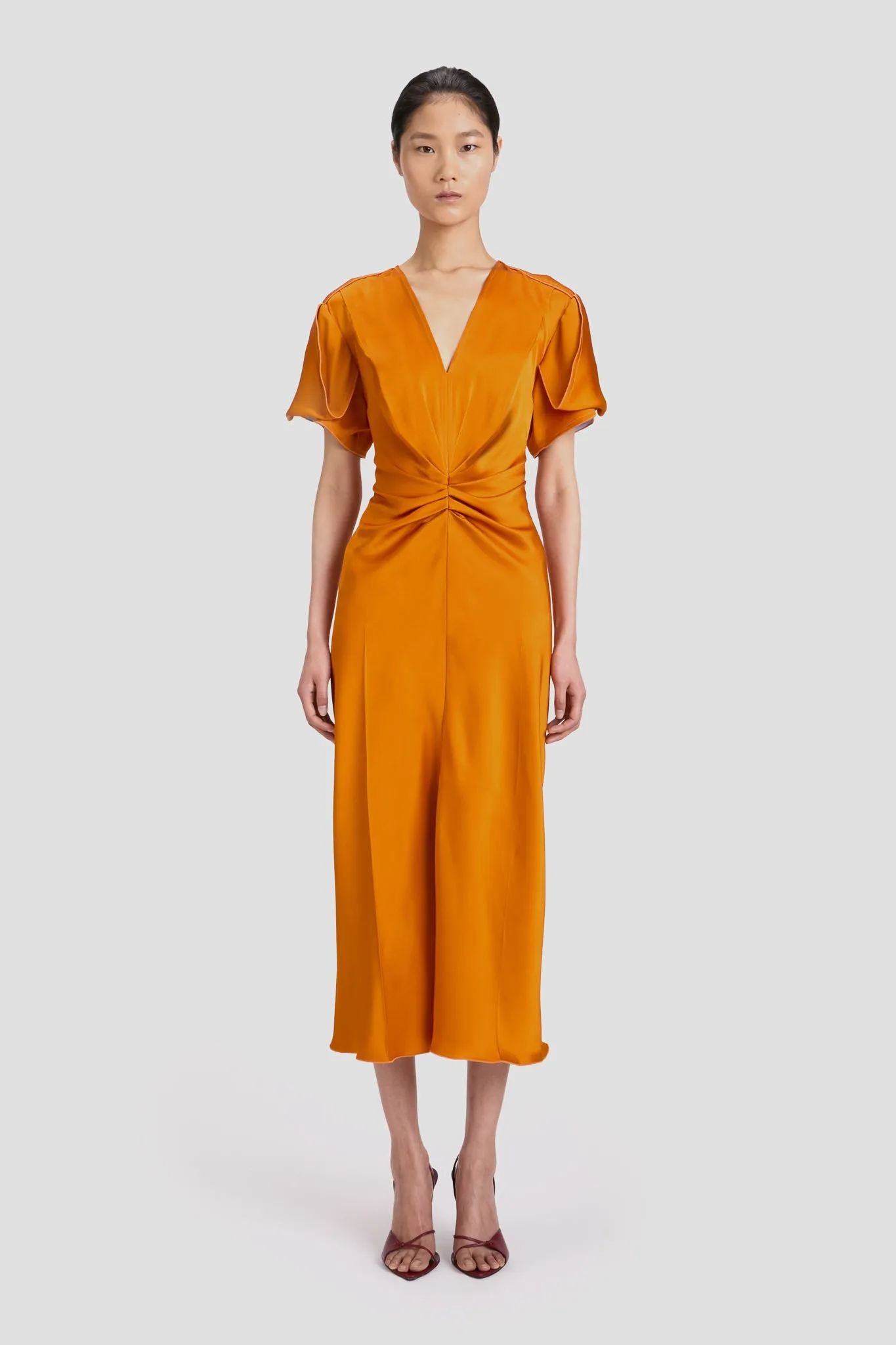 Eva V-Neck Midi Dress In Sunset Orange sold by Victoria Beckham