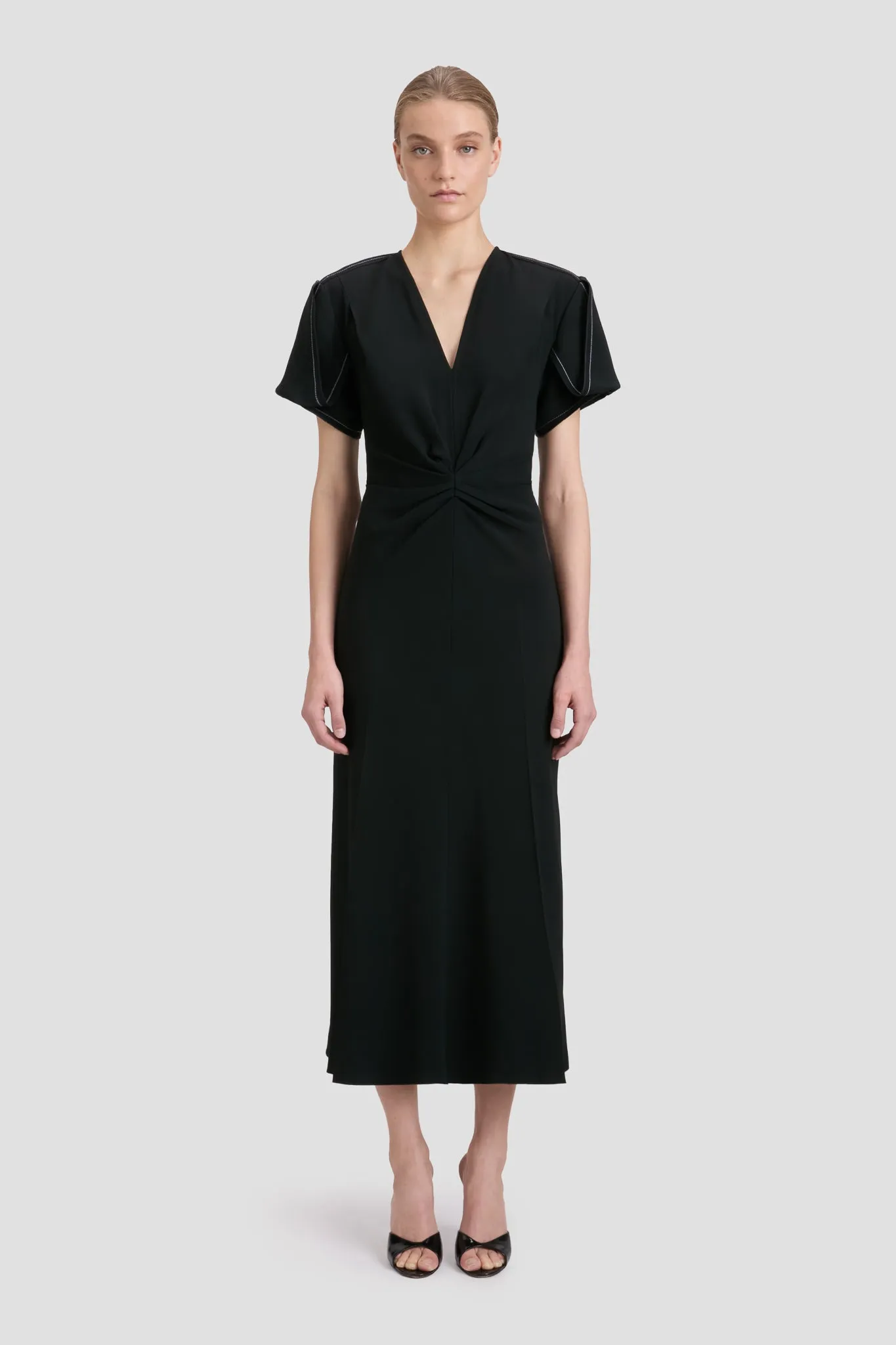 Eva V-Neck Midi Dress in Black sold by Victoria Beckham
