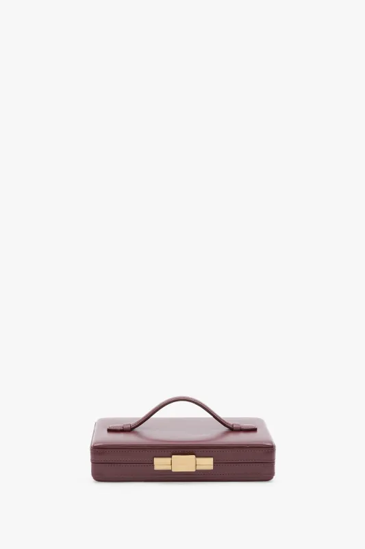 Box Clutch In Burgundy Smooth Leather sold by Victoria Beckham