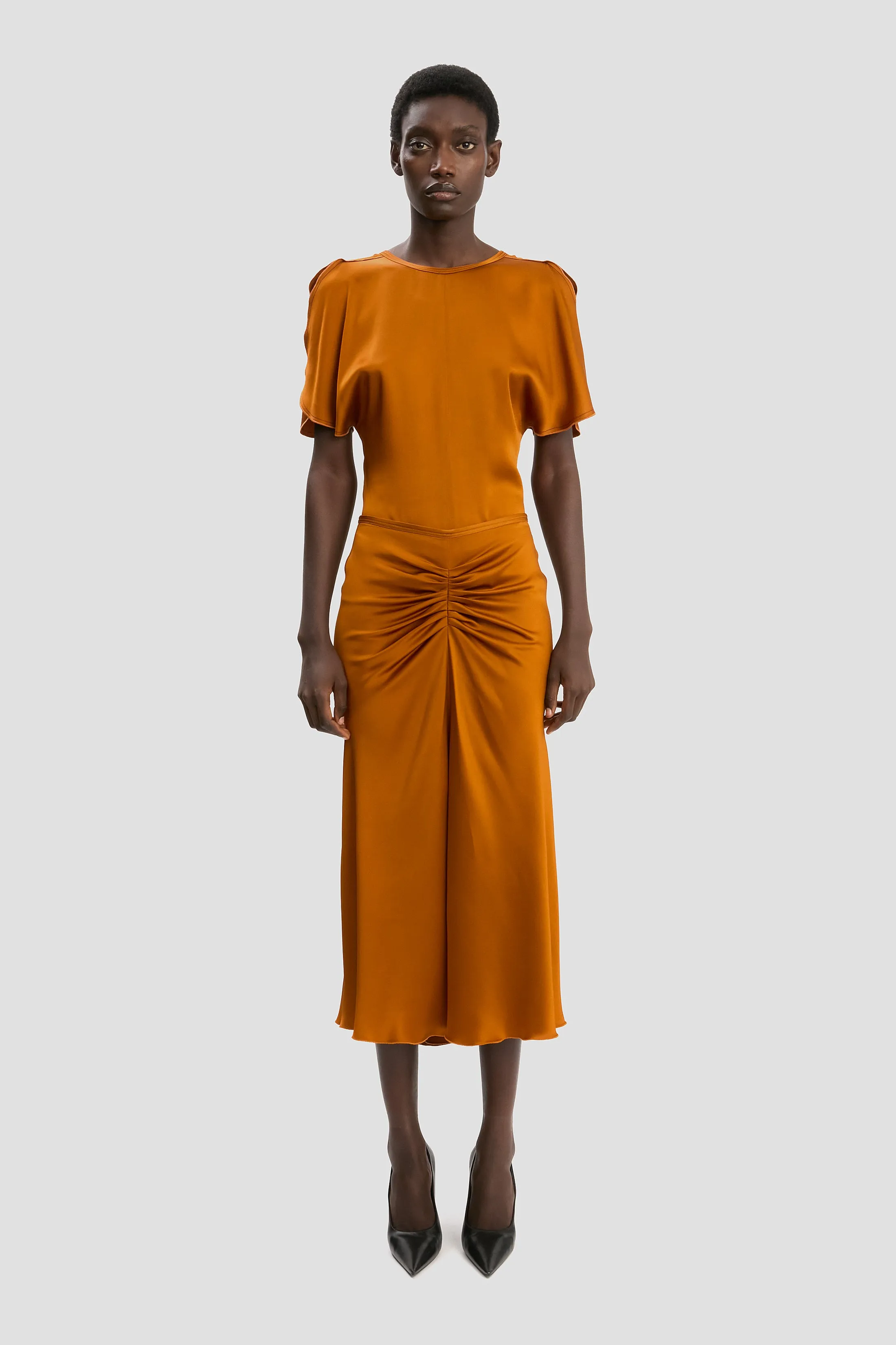 Bela Midi Skirt In Bronze sold by Victoria Beckham