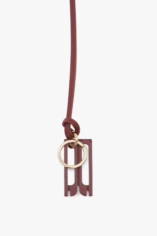 Dorian Keyring In Brick Red made by Victoria Beckham