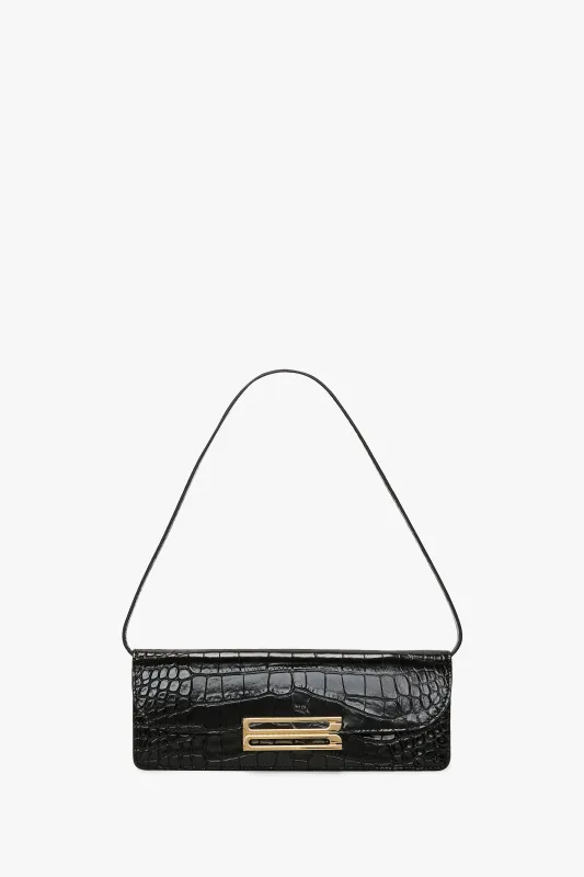 Dorian East-West Clutch made by Victoria Beckham
