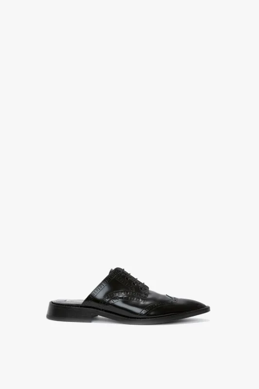 Flat Lace Up Mules In Black Leather sold by Victoria Beckham