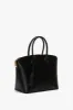 Victoria Top Handle Bag In Black Leather sold by Victoria Beckham