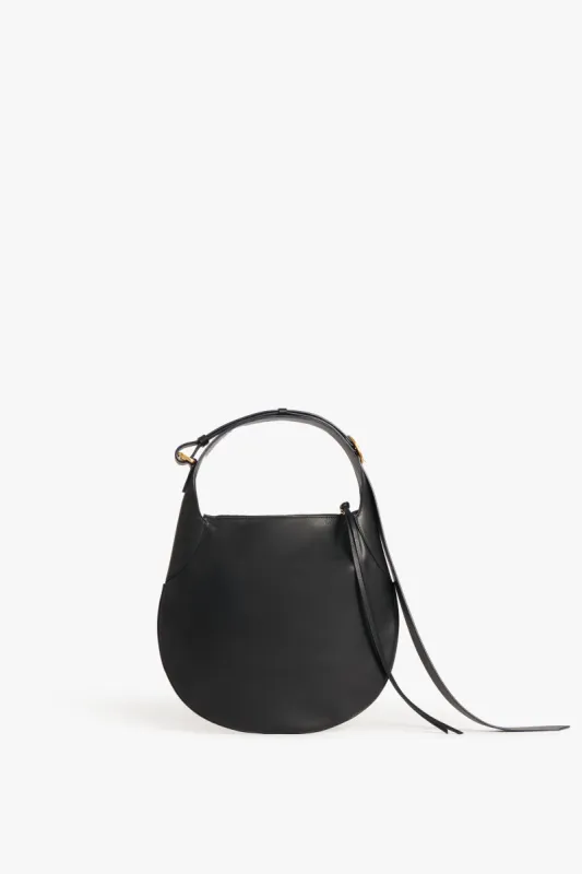 Small Half Moon Bag In Black Leather sold by Victoria Beckham