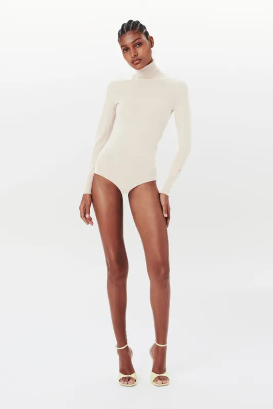 Poloneck Bodysuit In Cream sold by Victoria Beckham
