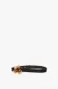 Exclusive Flower Belt In Black And Gold sold by Victoria Beckham