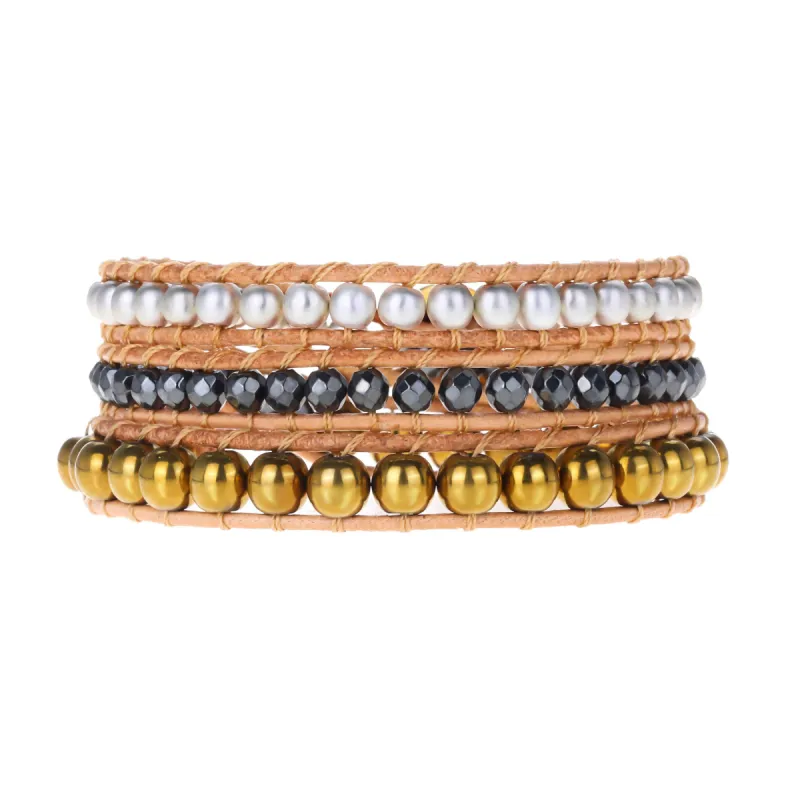 Gold beads with Hematite Crystals on Natural sold by Victoria Emerson