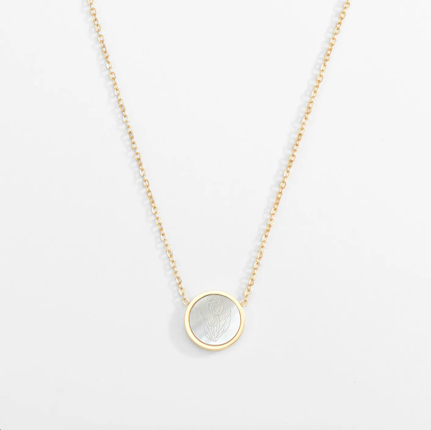 Ivory Botanical Pendant Necklace sold by Victoria Emerson