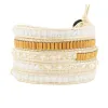 Crystals with Long Gold Beads on White sold by Victoria Emerson