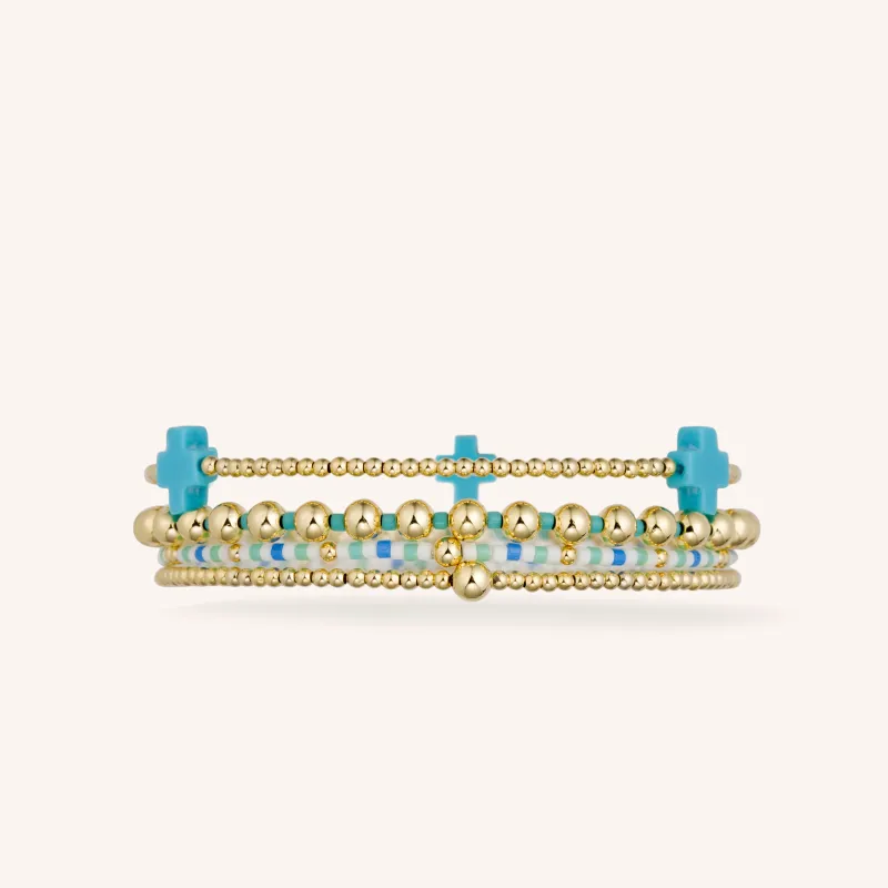 Turquoise And Gold Stacking Set sold by Victoria Emerson