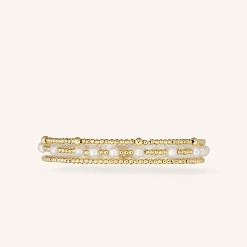 Mixed Sized Gold Beads and Pearls Stacking Set sold by Victoria Emerson