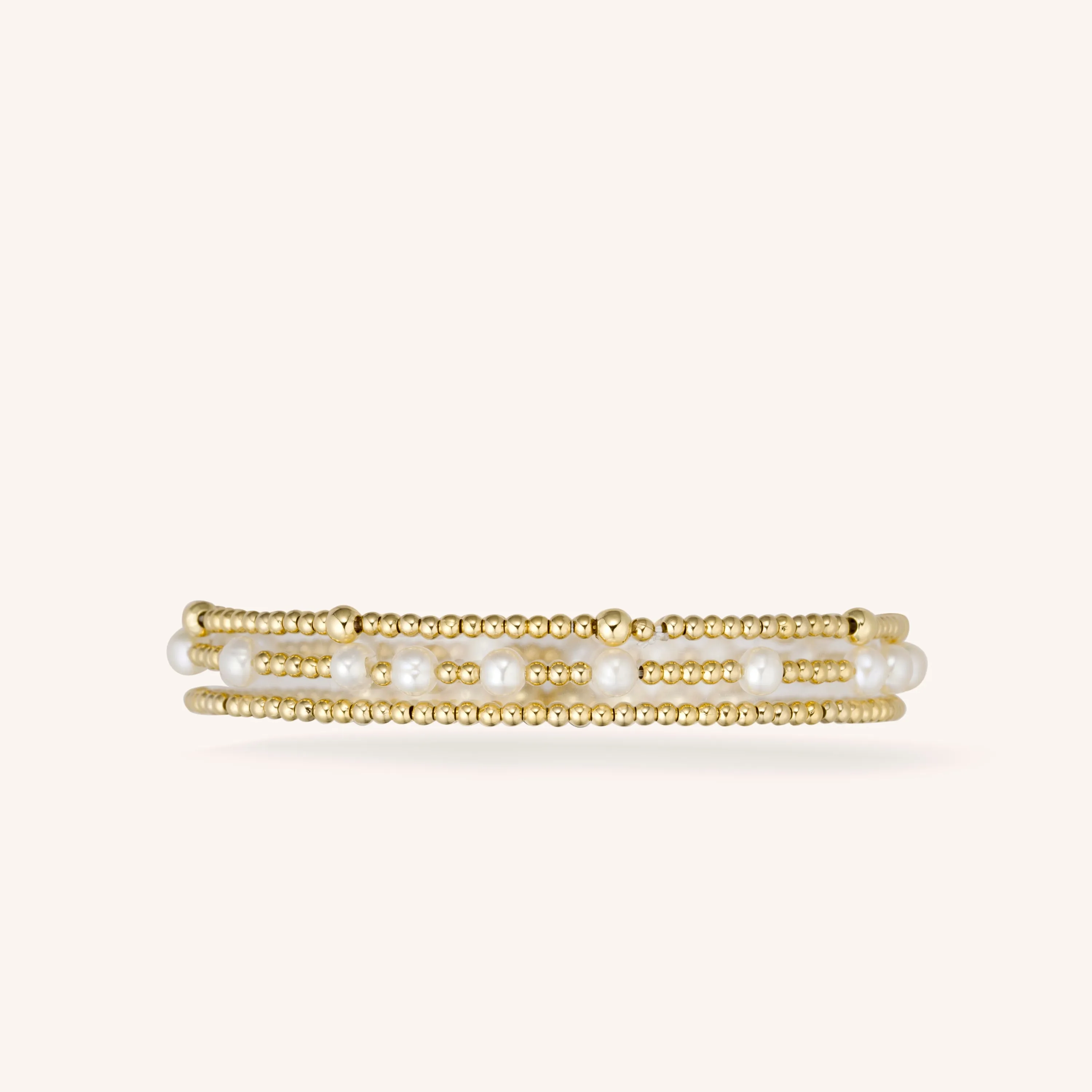 Mixed Sized Gold Beads and Pearls Stacking Set sold by Victoria Emerson