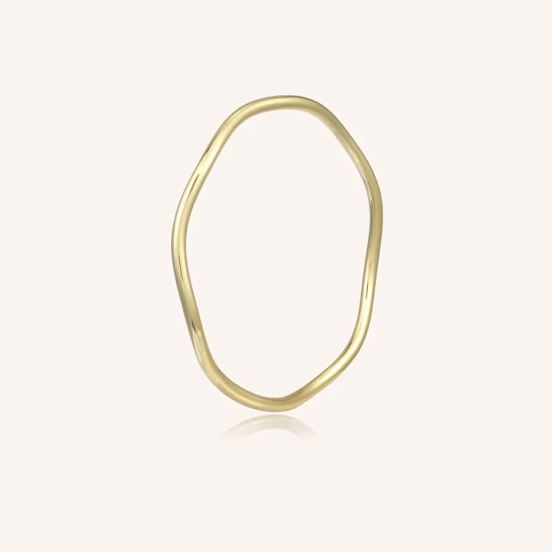 Eve Wavy Gold Bangle sold by Victoria Emerson