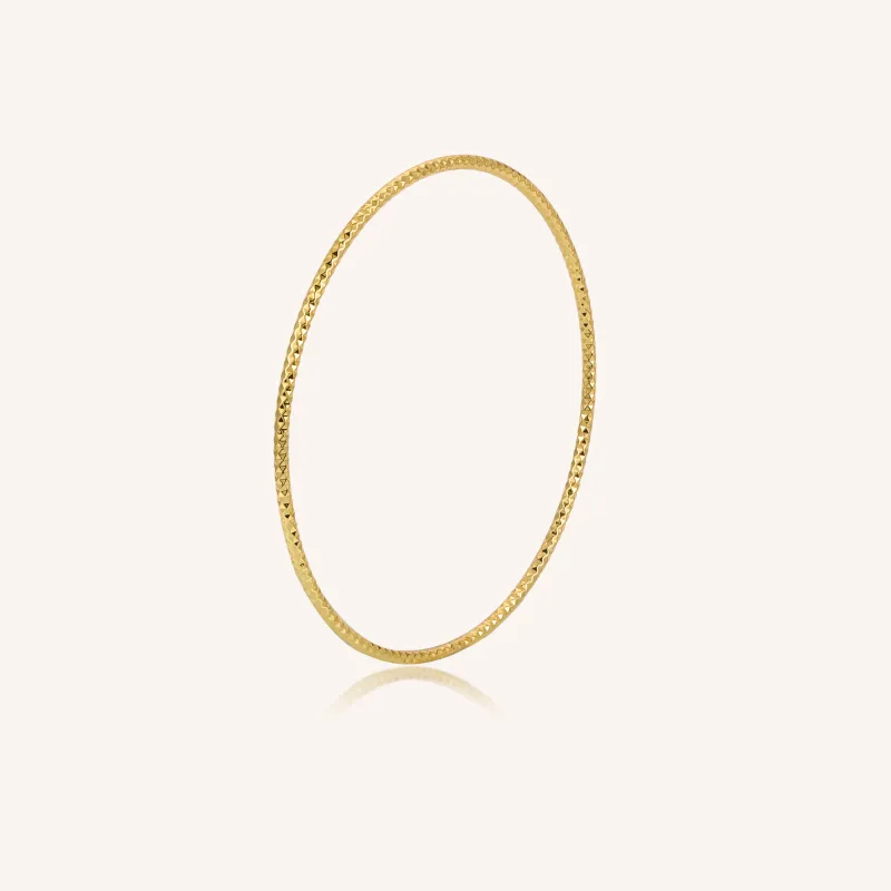 Madeline Thin Gold Bangle sold by Victoria Emerson