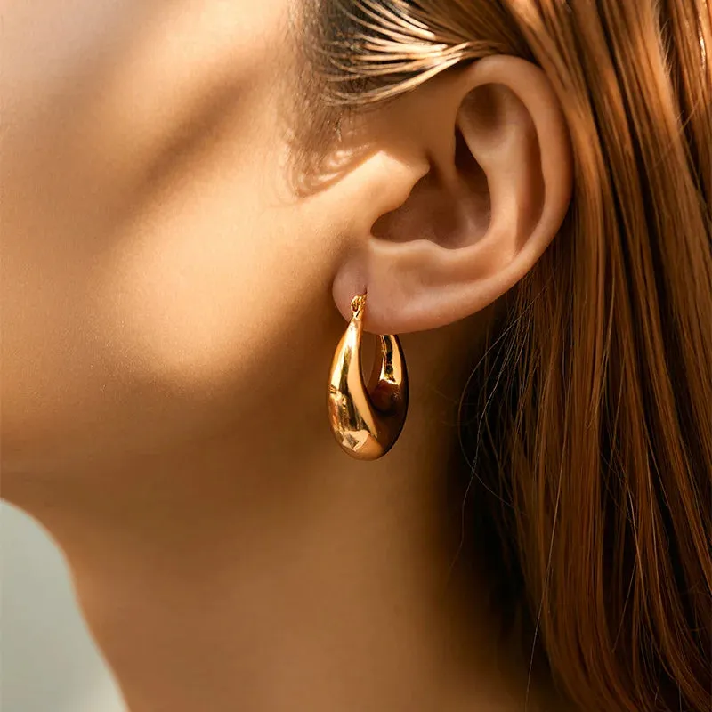 Thick Textured Geometric Circle Hoops sold by Victoria Emerson