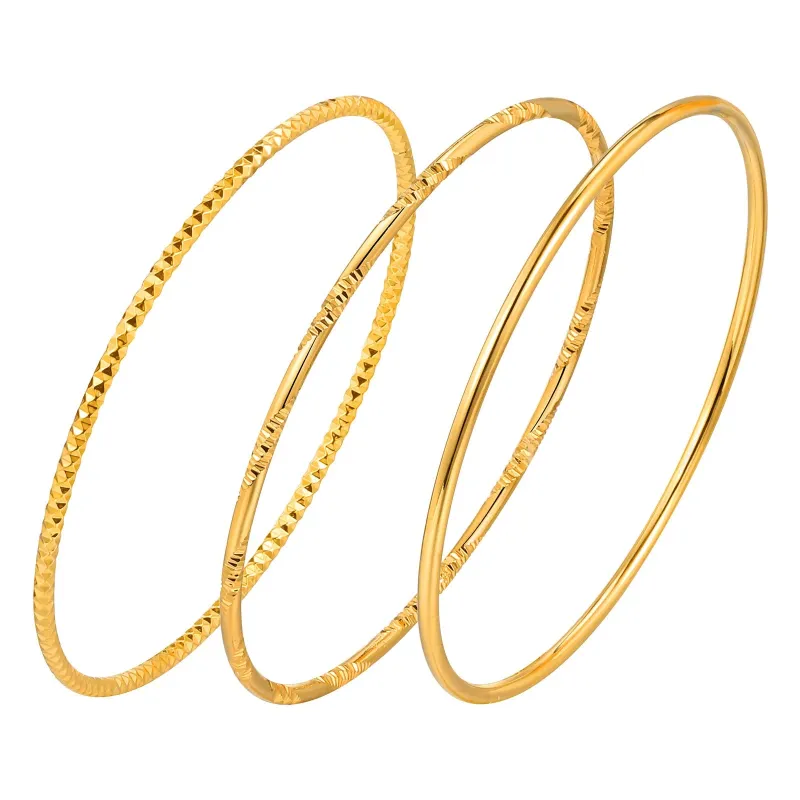 Glossy Gold Stackable Bangle sold by Victoria Emerson