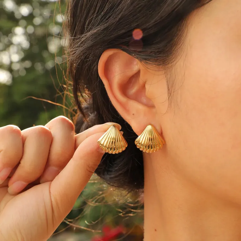 The Striped Shell Stud Earrings sold by Victoria Emerson