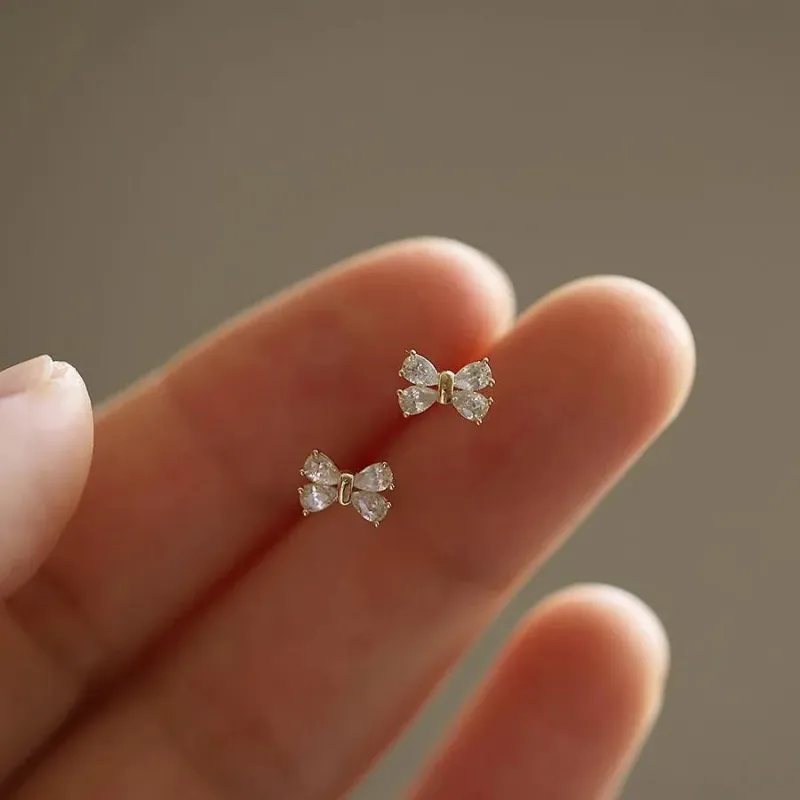 Mini Gold Stud Earrings sold by Victoria Emerson