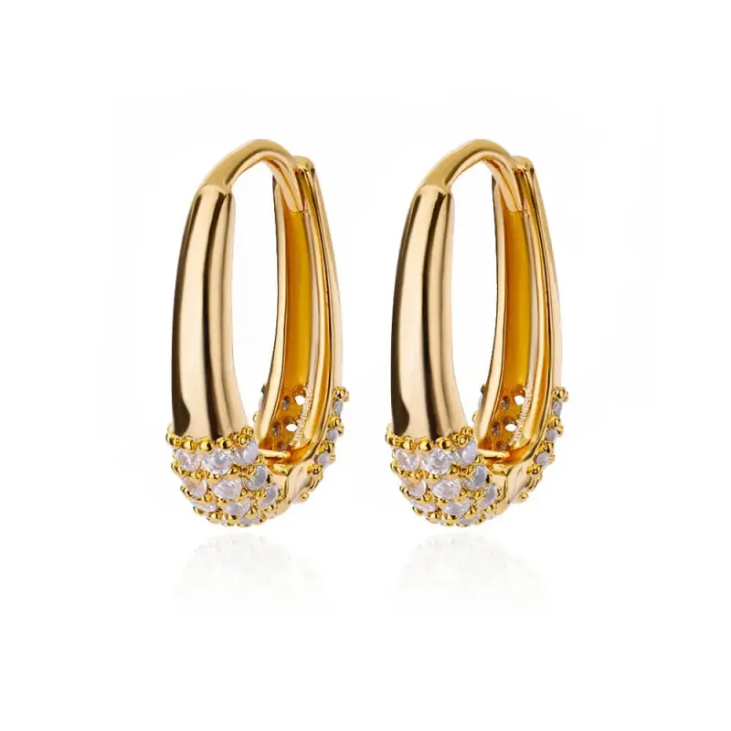Pavé Curve Huggie Hoops sold by Victoria Emerson