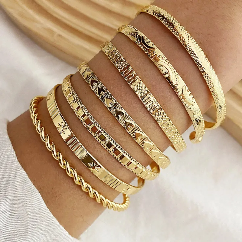 Gold Bangle Set (7-Piece) made by Victoria Emerson
