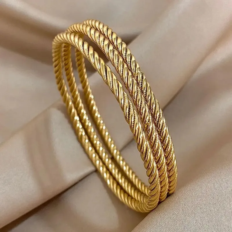 18K Gold-Plated Twisted Bangle Set (3-Piece) made by Victoria Emerson