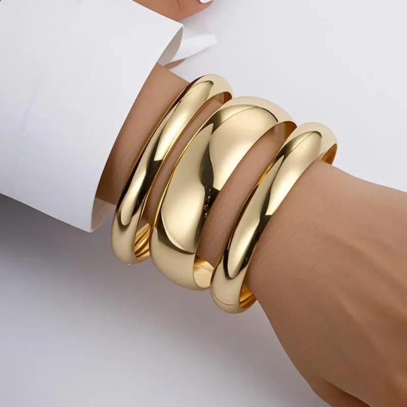 Gold Wide Bangle Set (3-Piece) made by Victoria Emerson