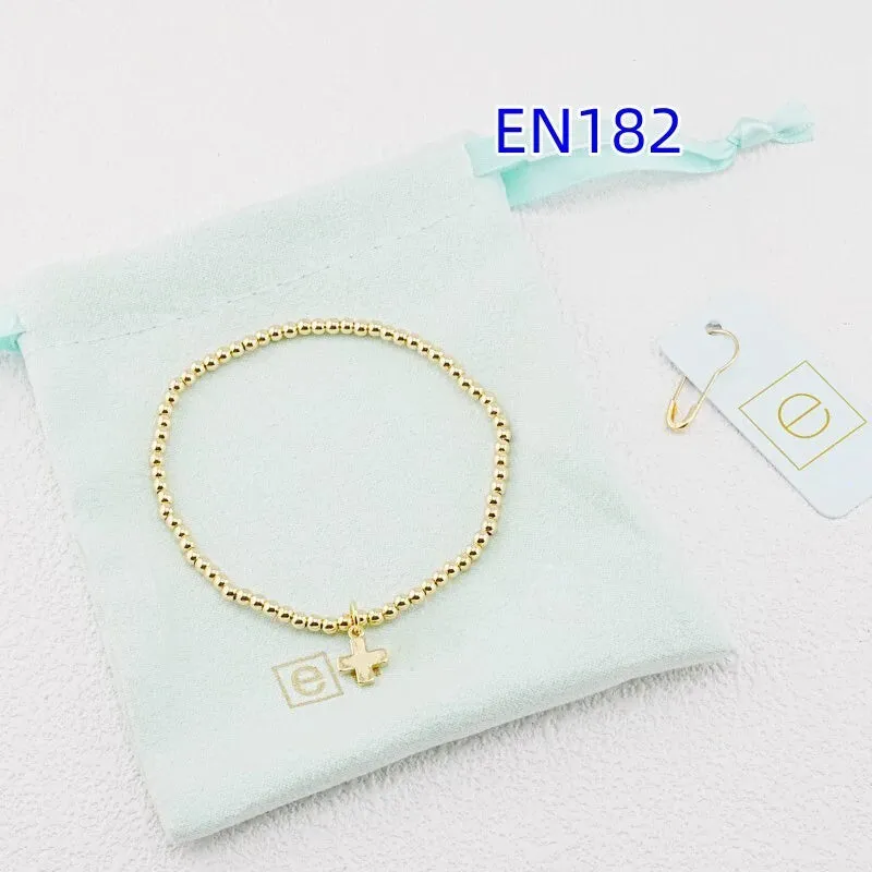 Gold Cross & Round Bead Bracelet made by Victoria Emerson