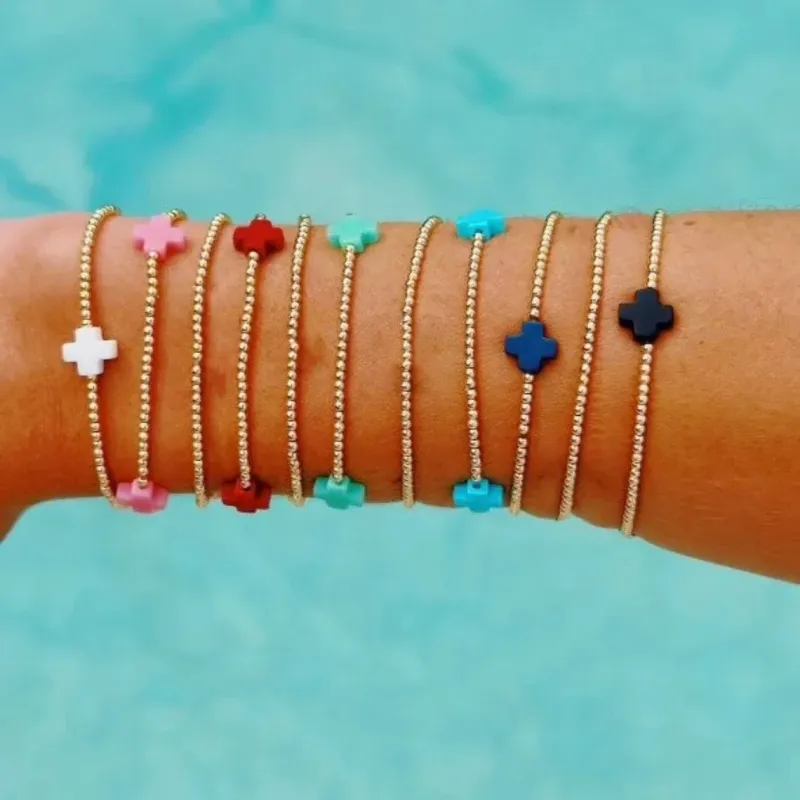 Cross Charm Beaded Bracelet made by Victoria Emerson
