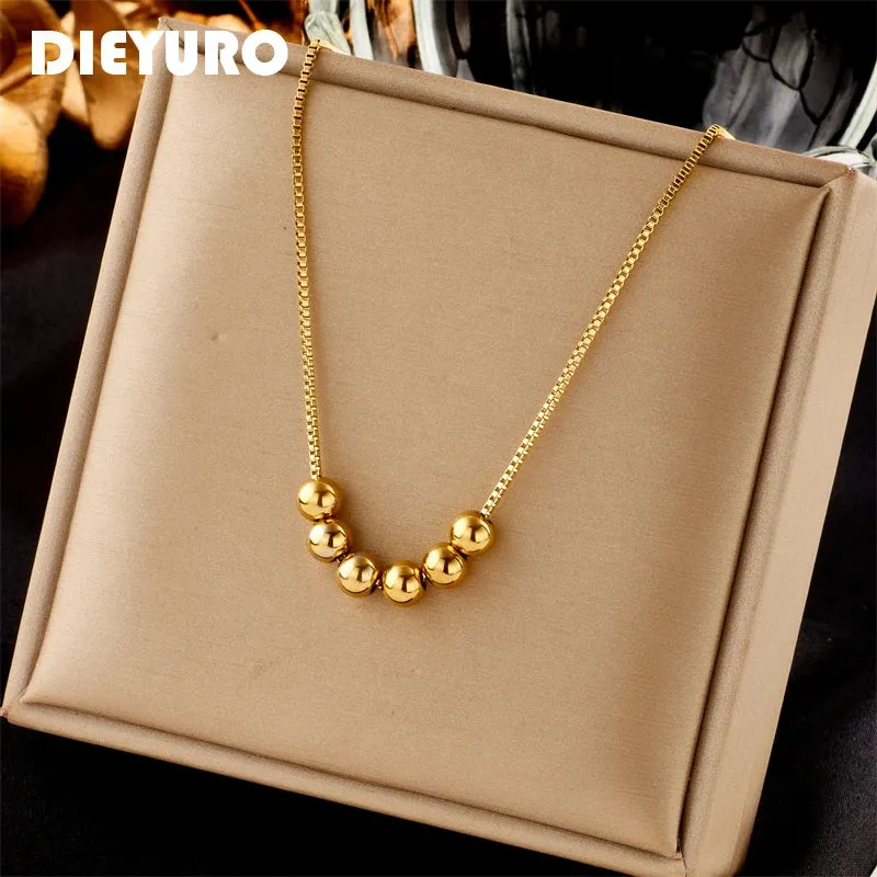 Gold Beaded Pendant Necklace made by Victoria Emerson