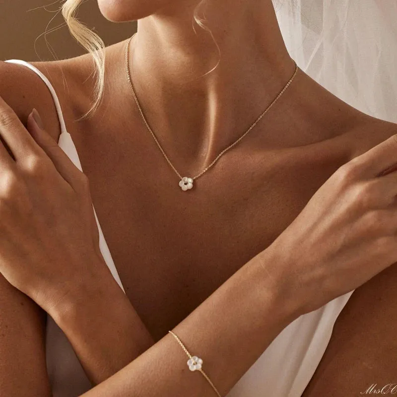 Dainty Gold Flower Jewelry Set sold by Victoria Emerson