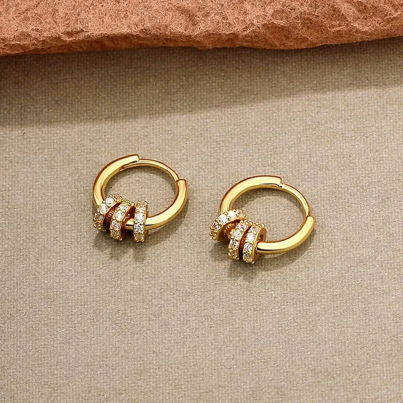 Gold Geometric Hoop Earrings with Zircon sold by Victoria Emerson