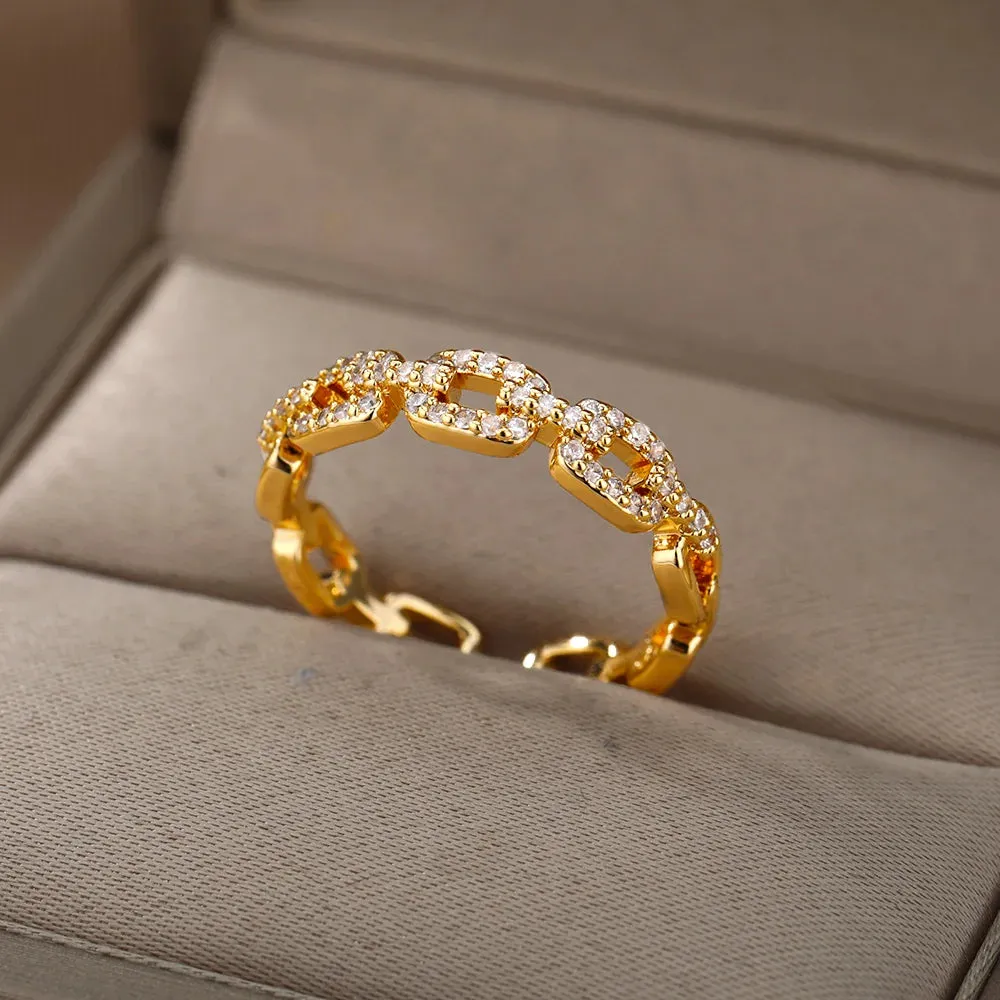 Geometric Twist Chain Ring sold by Victoria Emerson
